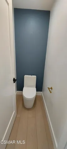 a bathroom with a toilet