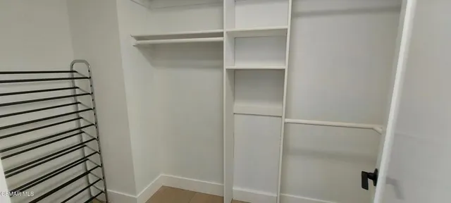 a view of a room with rack on the wall