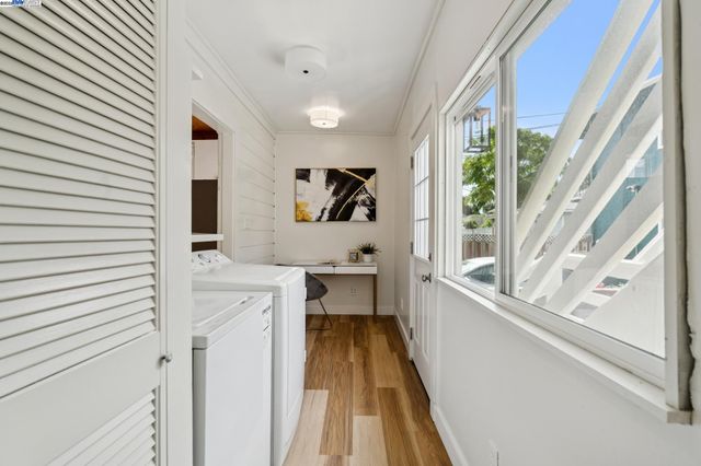 a bed room with a bed and a chair