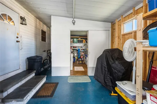 a view of a big room with wooden walls
