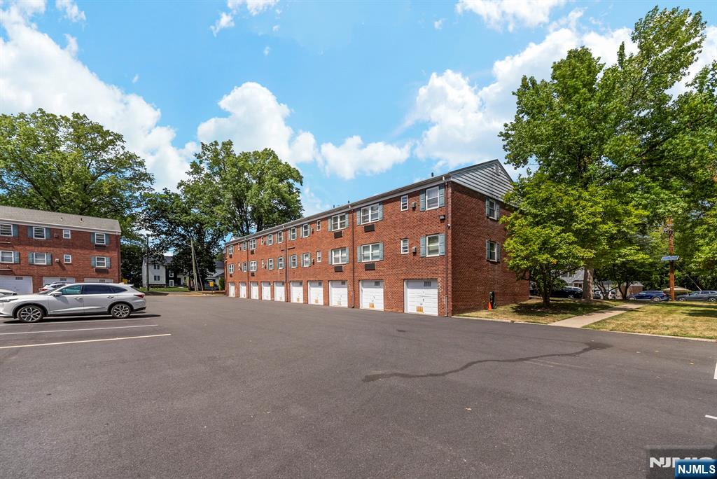 54 Westervelt Avenue, Unit B Tenafly, NJ 07670 - Photo 17 of 17 a view of a street with a building in the background