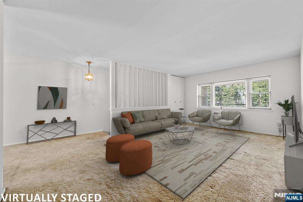 54 Westervelt Avenue, Unit B Tenafly, NJ 07670 - Photo 4 of 17 a living room with furniture and a window