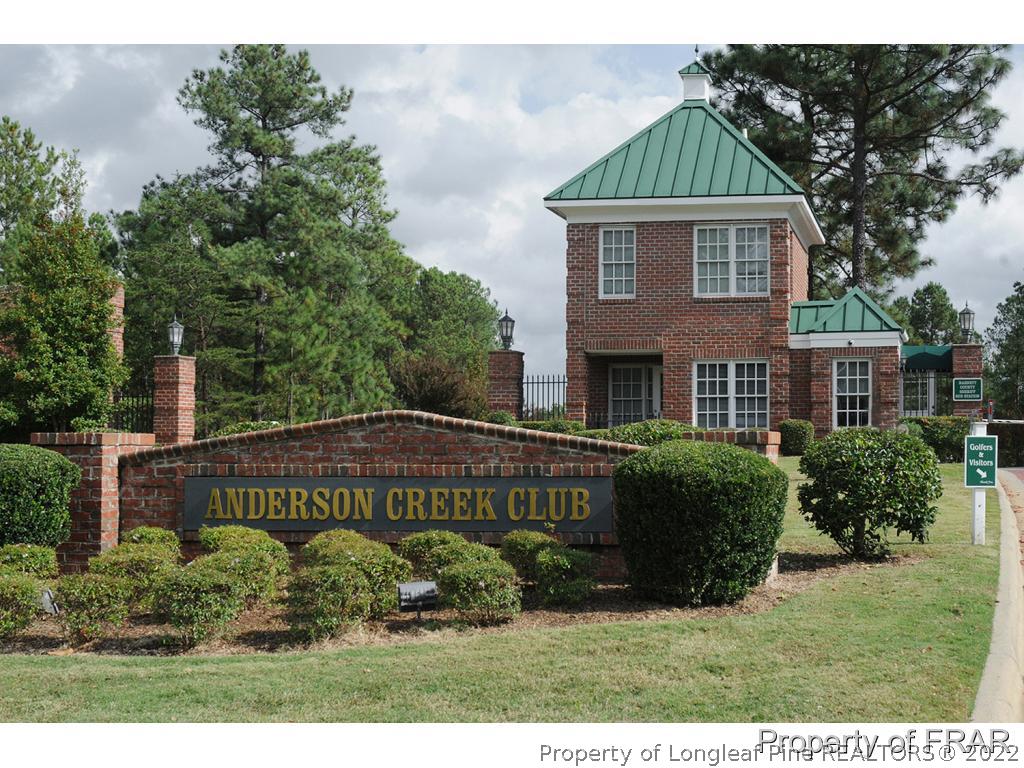 61 Piney Pond Road Spring Lake, NC 28390 - Photo 1 of 1 a front view of a house with a garden