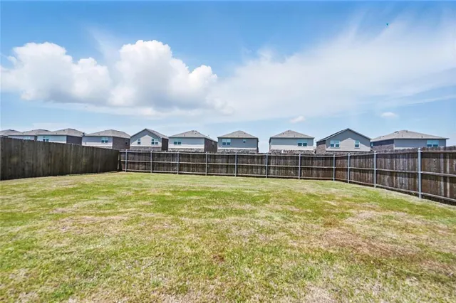 swimming pool view with a lake view