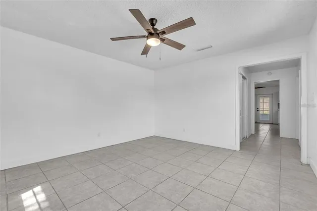wooden floor in an empty room and a window