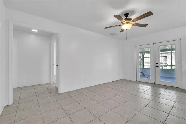 a view of an empty room and window