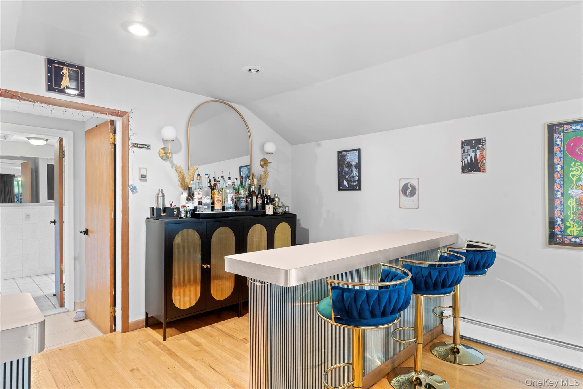 568 Old Liberty Road Monticello, NY 12701 - Photo 17 of 31 This flexible space is currently setup as a chill speakeasy but could very easily be converted back to a bedroom, or playroom, home gym, or media room.