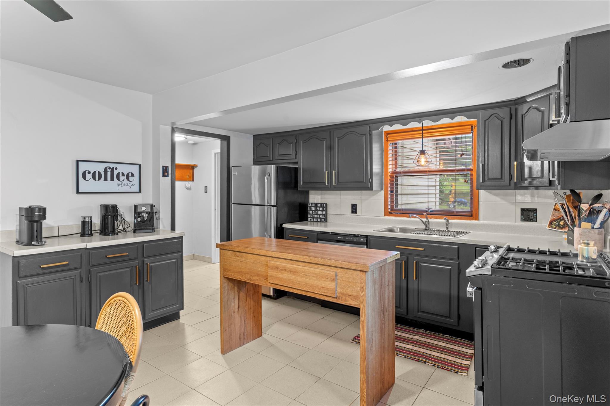 568 Old Liberty Road Monticello, NY 12701 - Photo 7 of 31 Kitchen with stainless steel appliances and updated cabinets