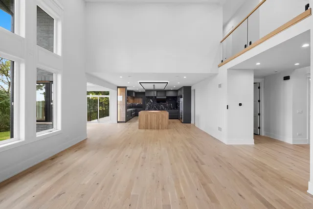 a kitchen with stainless steel appliances granite countertop a stove and a sink