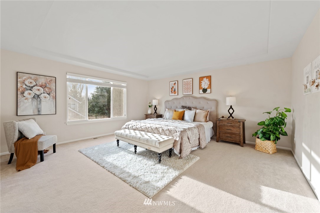 17567 Southeast 186th Way Renton, WA 98058 - Photo 14 of 28 a bedroom with a bed flowerpot and window