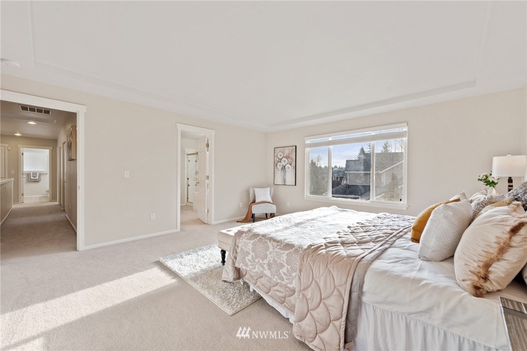 17567 Southeast 186th Way Renton, WA 98058 - Photo 15 of 28 a bedroom with a bed and a window