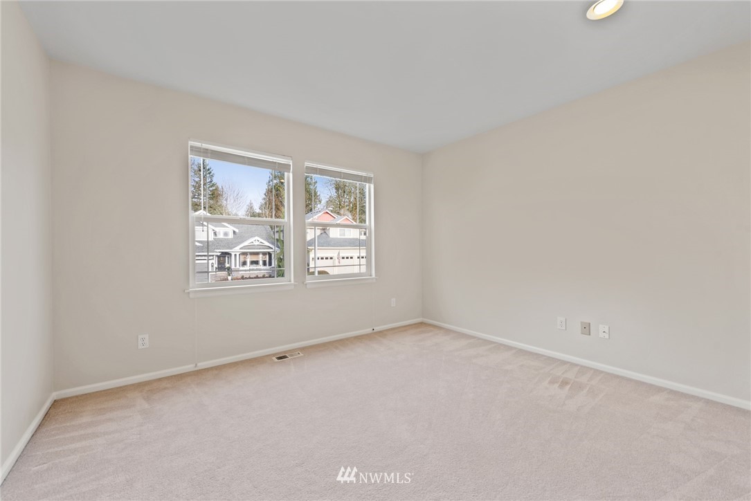 17567 Southeast 186th Way Renton, WA 98058 - Photo 21 of 28 an empty room with windows