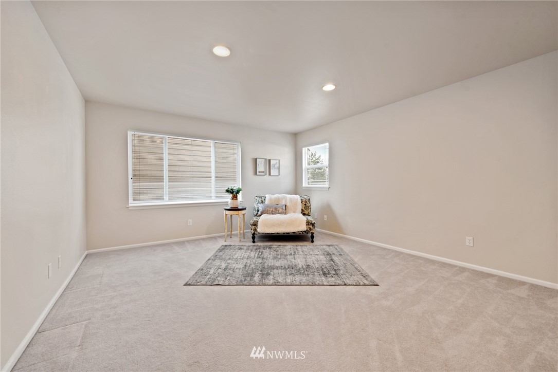 17567 Southeast 186th Way Renton, WA 98058 - Photo 22 of 28 a living room with furniture and a window