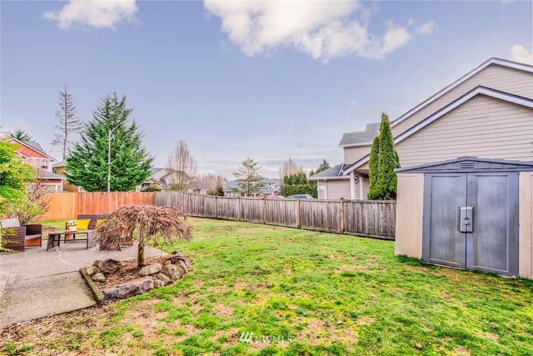 17567 Southeast 186th Way Renton, WA 98058 - Photo 26 of 28 a view of a backyard with a patio