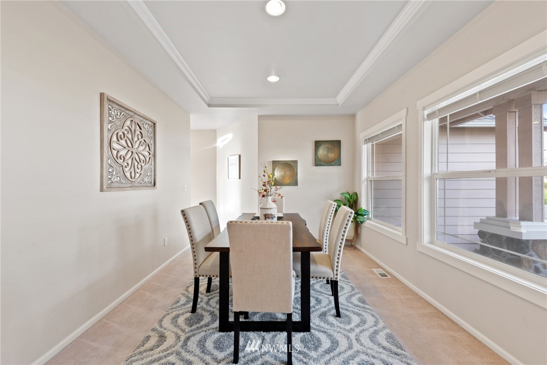 17567 Southeast 186th Way Renton, WA 98058 - Photo 5 of 28 a view of a dining room with furniture window and outside view