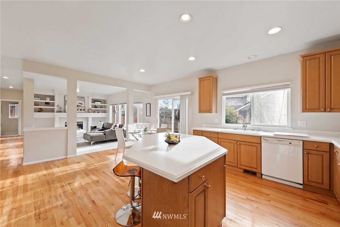 17567 Southeast 186th Way Renton, WA 98058 - Photo 9 of 28 a kitchen with a stove a refrigerator and a sink