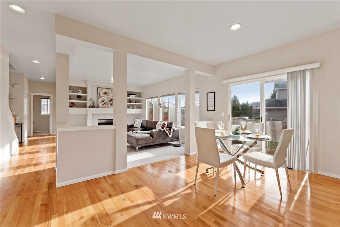 17567 Southeast 186th Way Renton, WA 98058 - Photo 10 of 28 a living room with furniture and a table