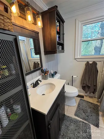 a bathroom with a sink and a toilet