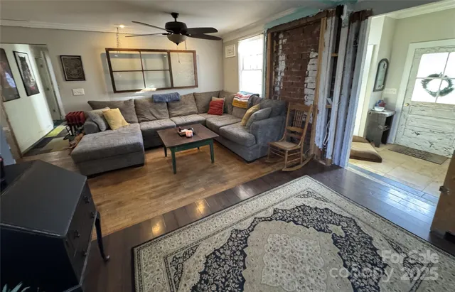 a living room with furniture and a rug