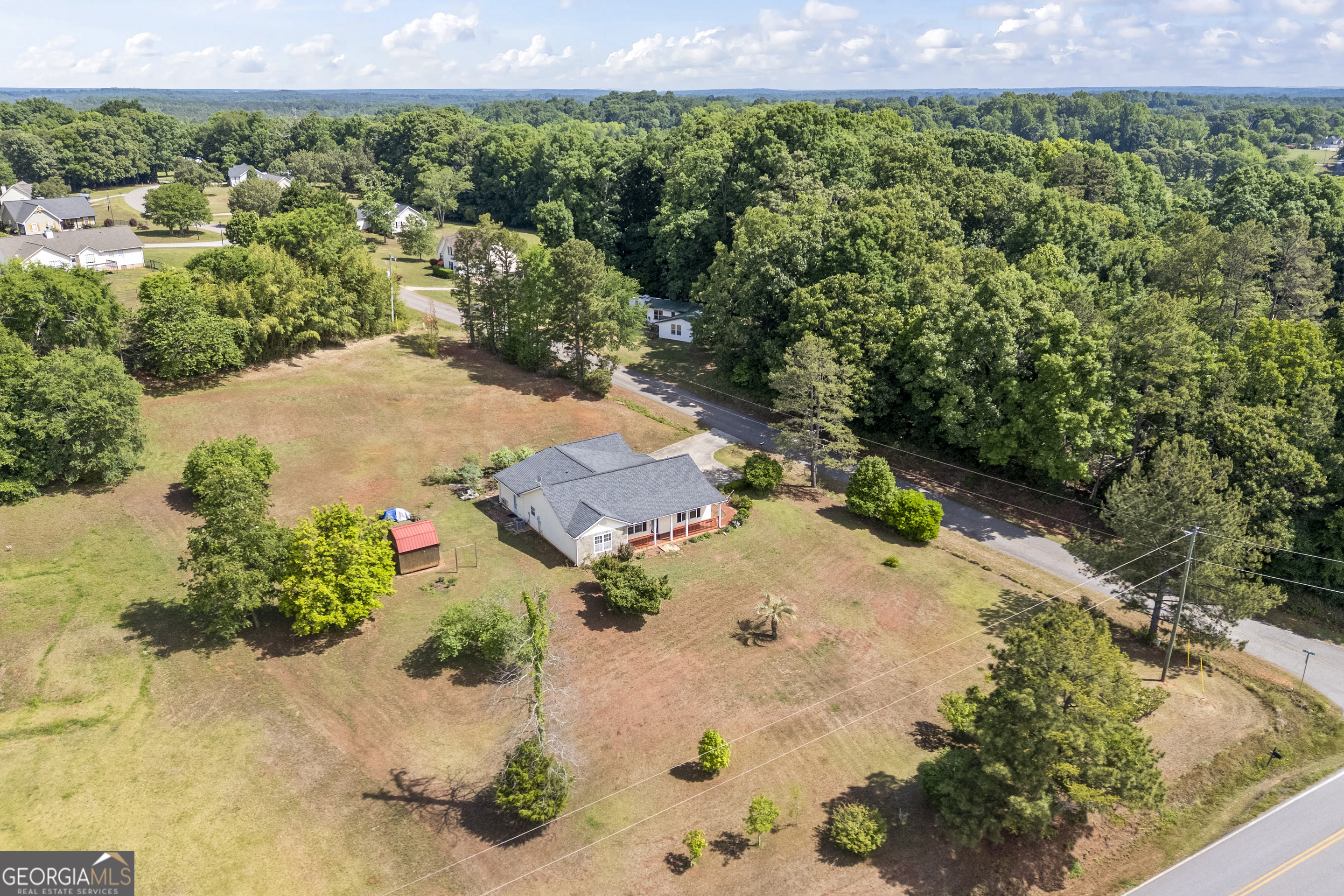 574 Mt Bethel Road Commerce, GA 30530 - Photo 14 of 64 an aerial view of a house with a yard