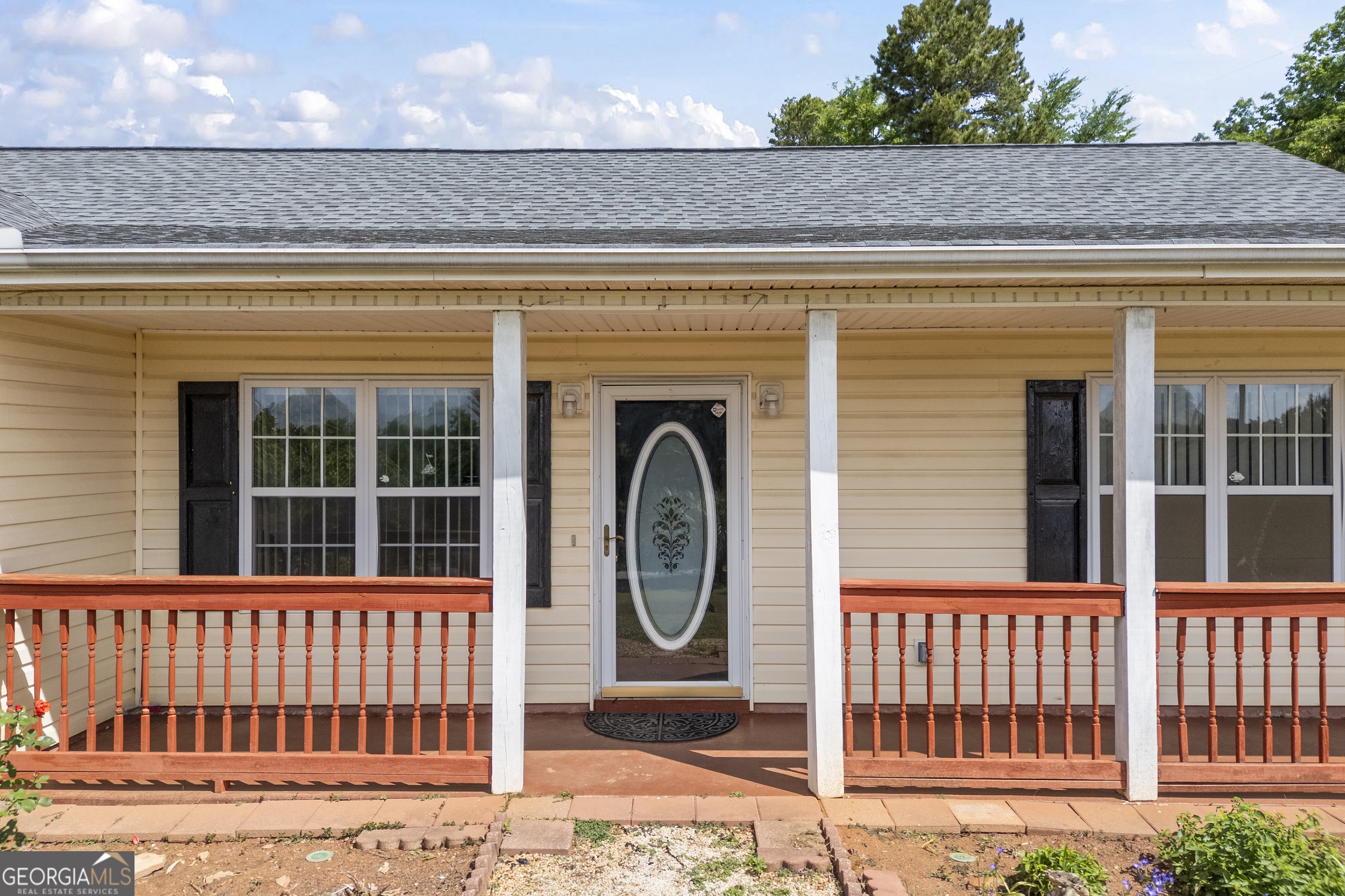 574 Mt Bethel Road Commerce, GA 30530 - Photo 17 of 64 a view of a porch with a fence