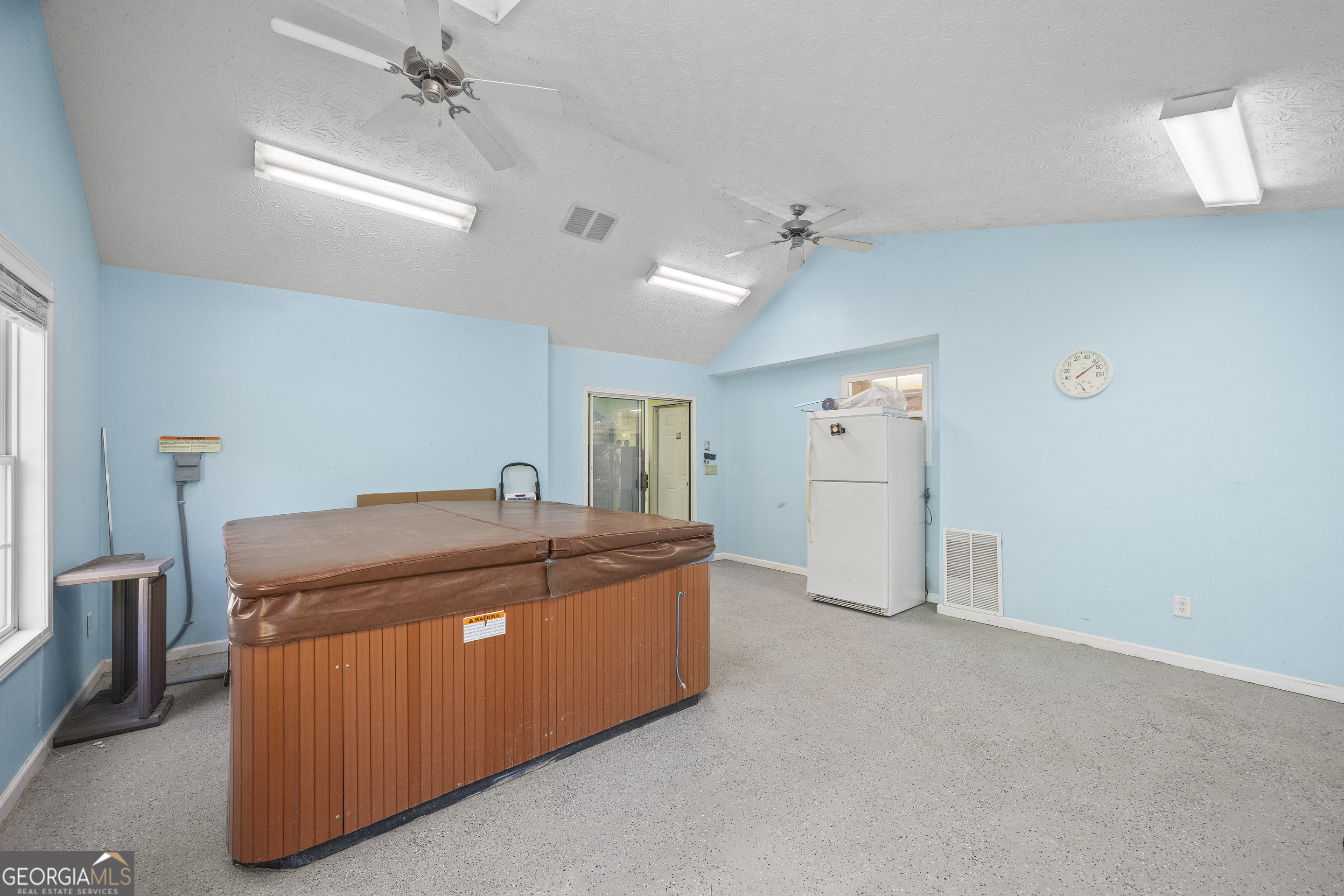 574 Mt Bethel Road Commerce, GA 30530 - Photo 38 of 64 a room with a sink and cabinets