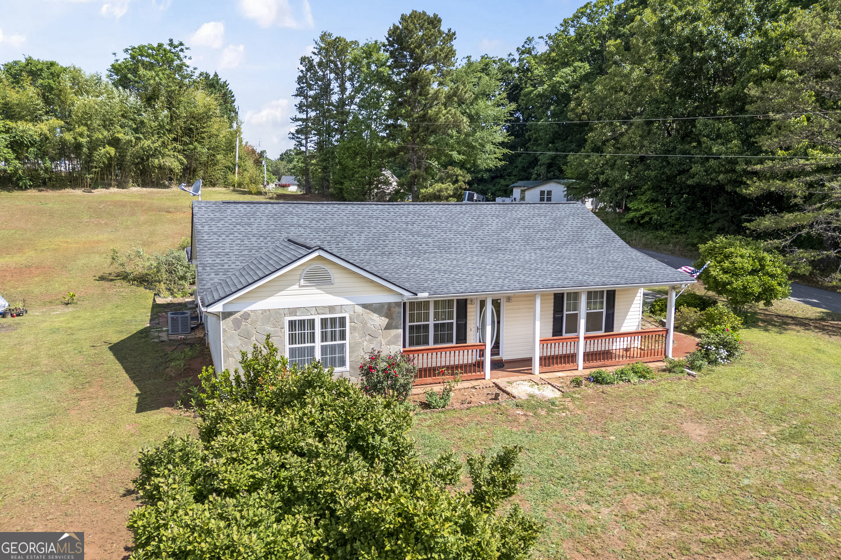 574 Mt Bethel Road Commerce, GA 30530 - Photo 4 of 64 front view of a house with a yard