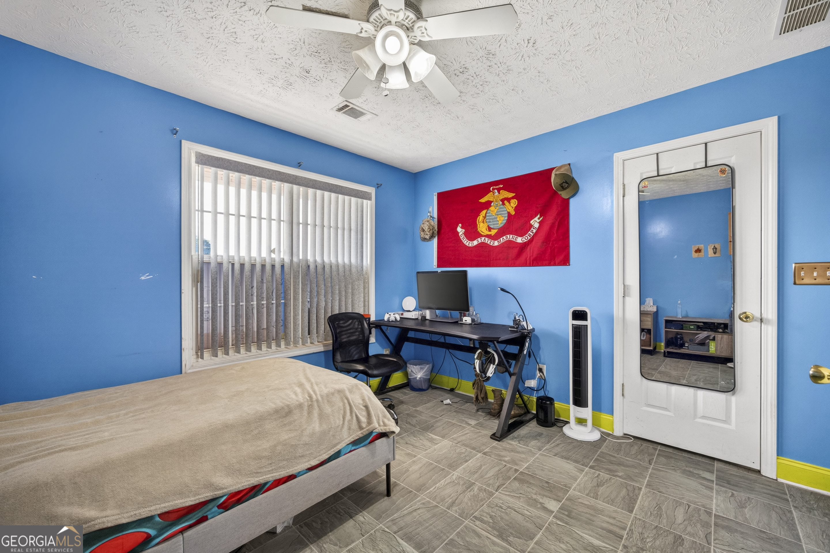 574 Mt Bethel Road Commerce, GA 30530 - Photo 48 of 64 a bed sitting in a room next to a window
