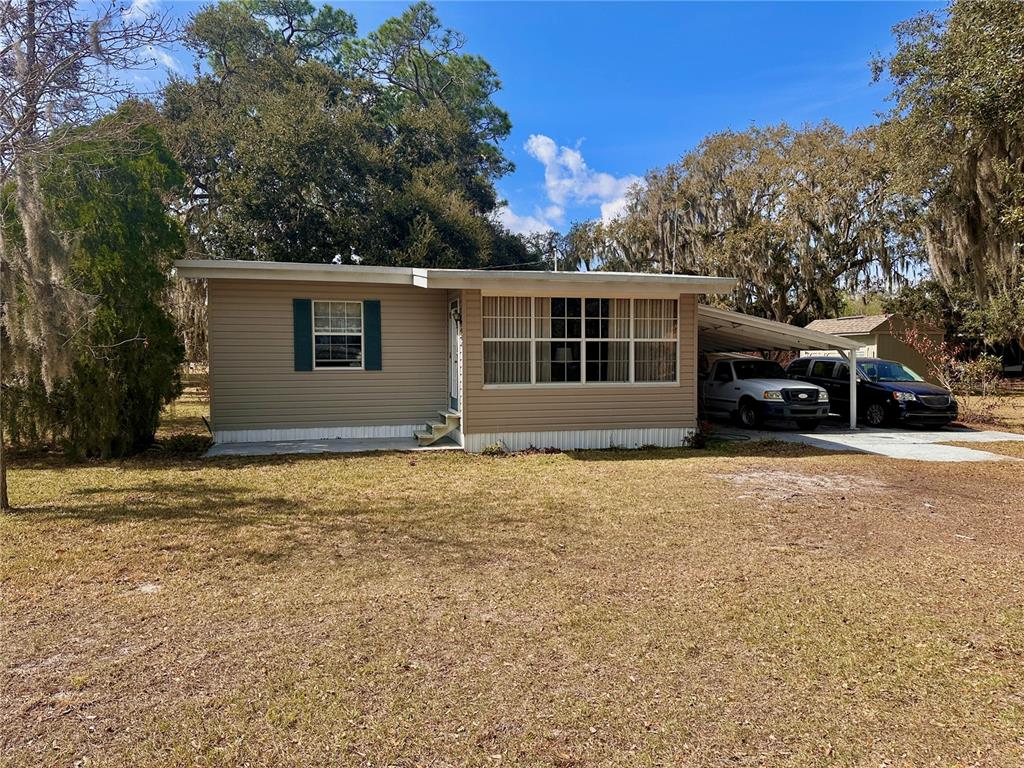 a house with trees in the background
