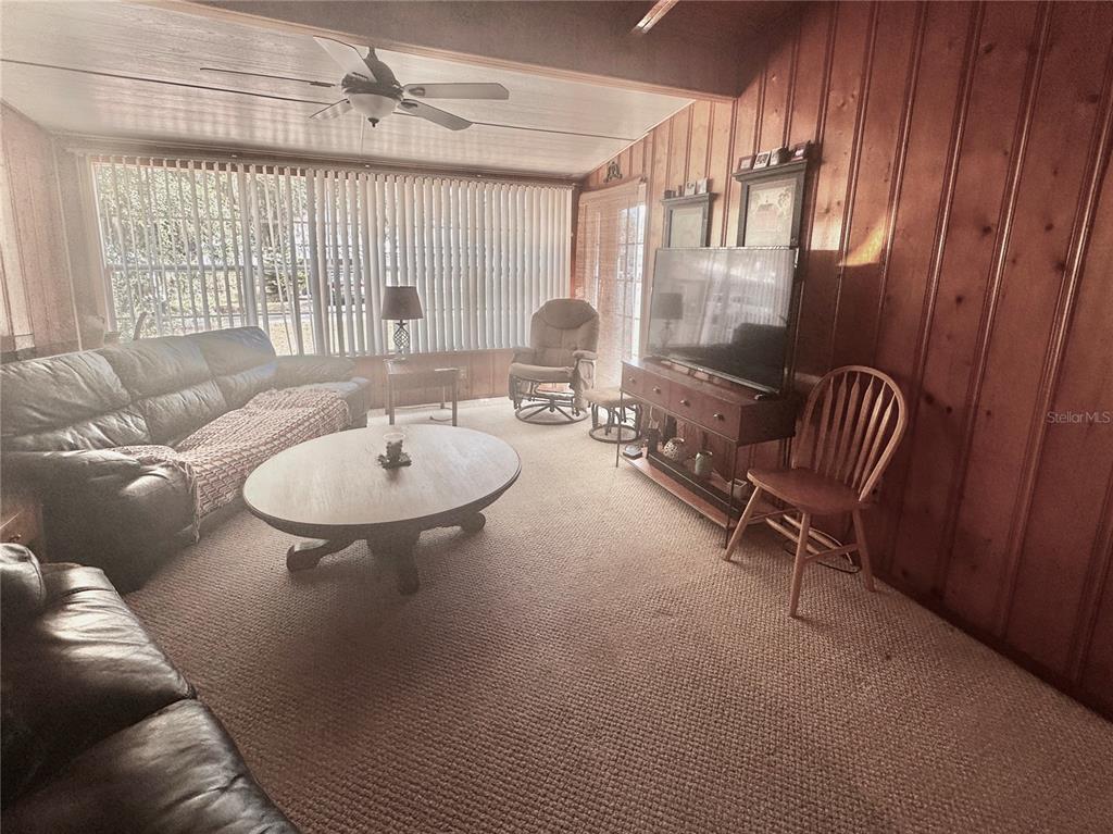 2807 Tindel Camp Road Lake Wales, FL 33898 - Photo 11 of 32 a living room with furniture and a window