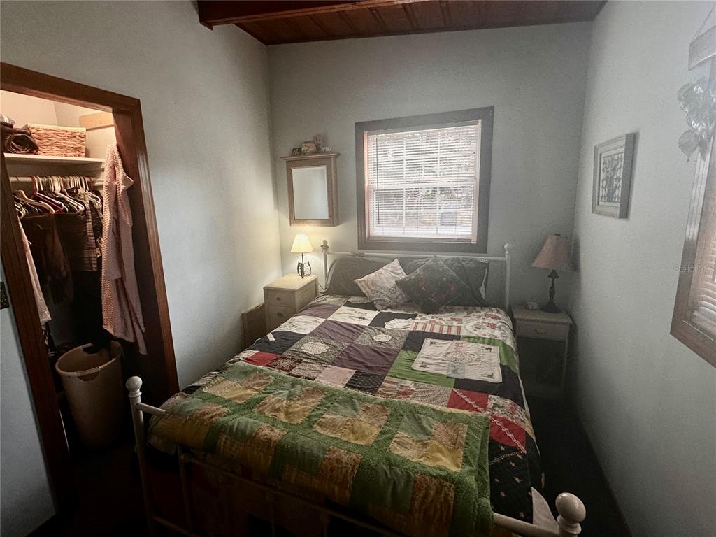 2807 Tindel Camp Road Lake Wales, FL 33898 - Photo 15 of 32 a bedroom with a bed and a window