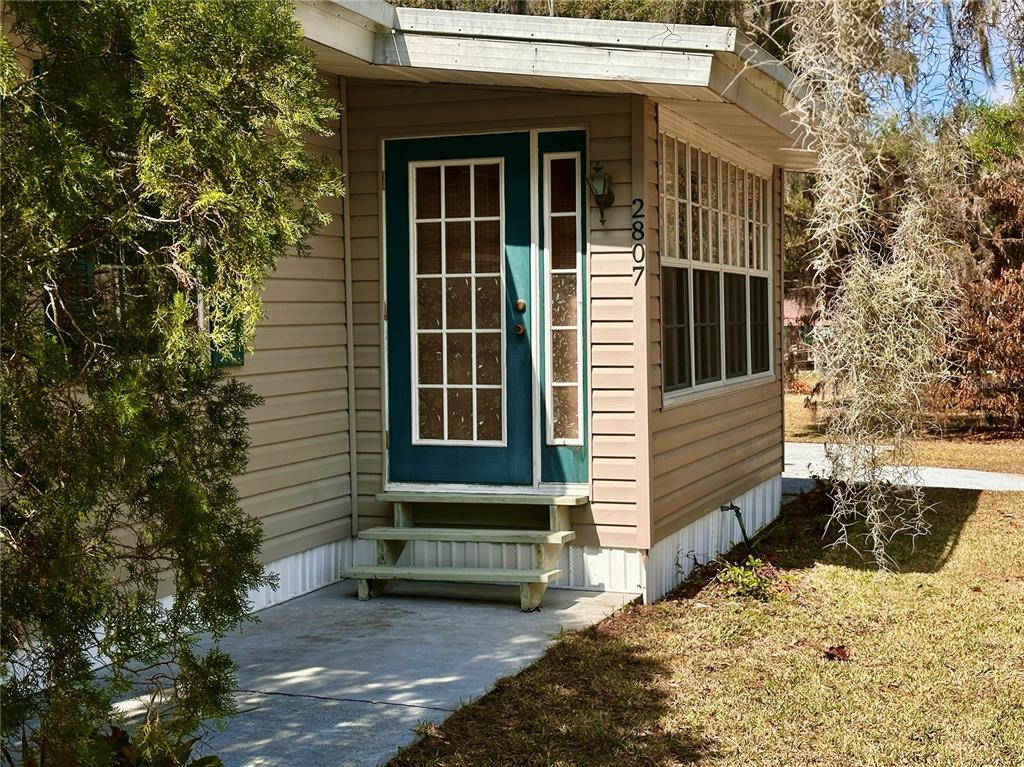 2807 Tindel Camp Road Lake Wales, FL 33898 - Photo 2 of 32 a view of a house with a yard