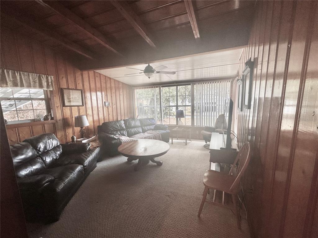 2807 Tindel Camp Road Lake Wales, FL 33898 - Photo 8 of 32 a living room with furniture and a large window