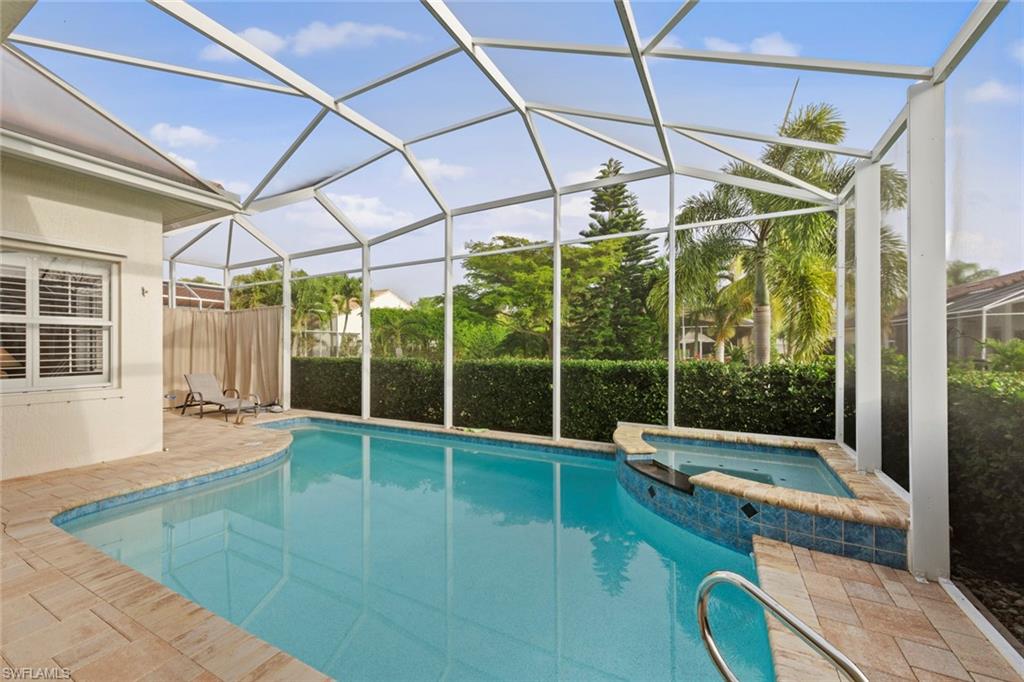 9057 Whitfield Drive Estero, FL 33928 - Photo 24 of 32 a view of a room with gym equipment