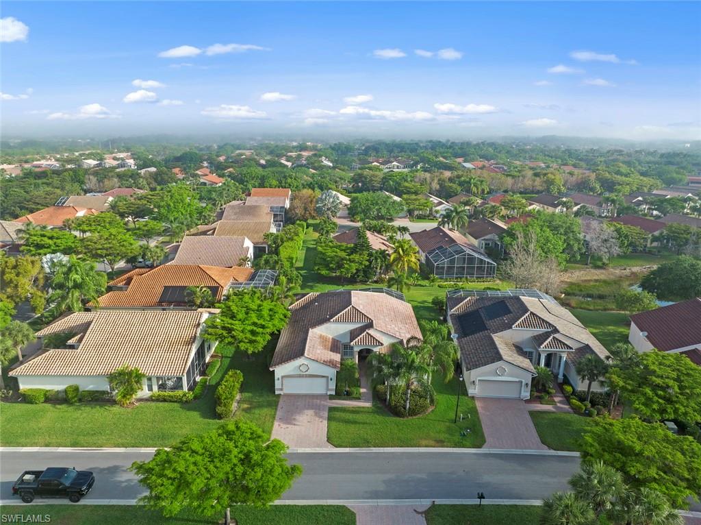 9057 Whitfield Drive Estero, FL 33928 - Photo 32 of 32 an aerial view of residential houses with outdoor space and street view