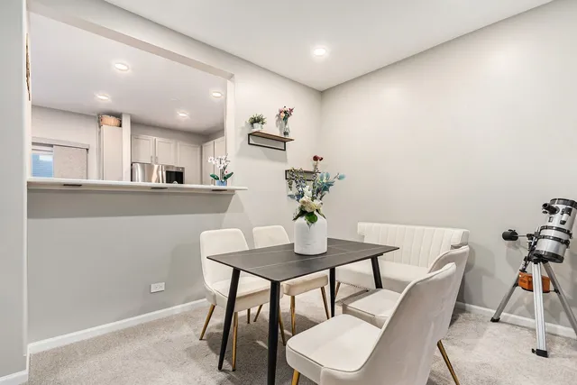 a view of a dining room with furniture