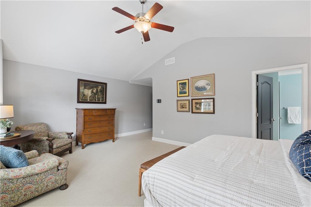2838 Jordan Oaks Lane Decatur, GA 30033 - Photo 25 of 39 a bedroom with a bed and ceiling fan