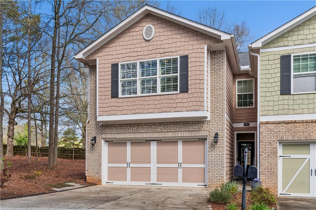 2838 Jordan Oaks Lane Decatur, GA 30033 - Photo 38 of 39 a front view of a house with a yard