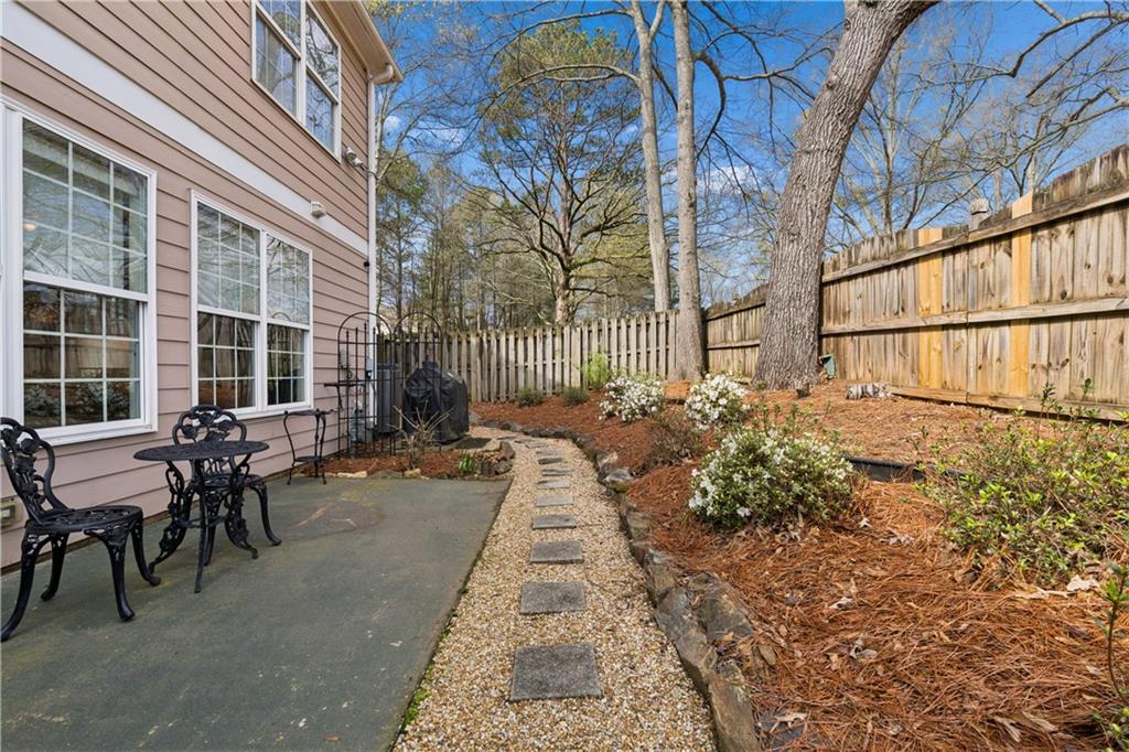 2838 Jordan Oaks Lane Decatur, GA 30033 - Photo 7 of 39 a backyard of a house with outdoor seating