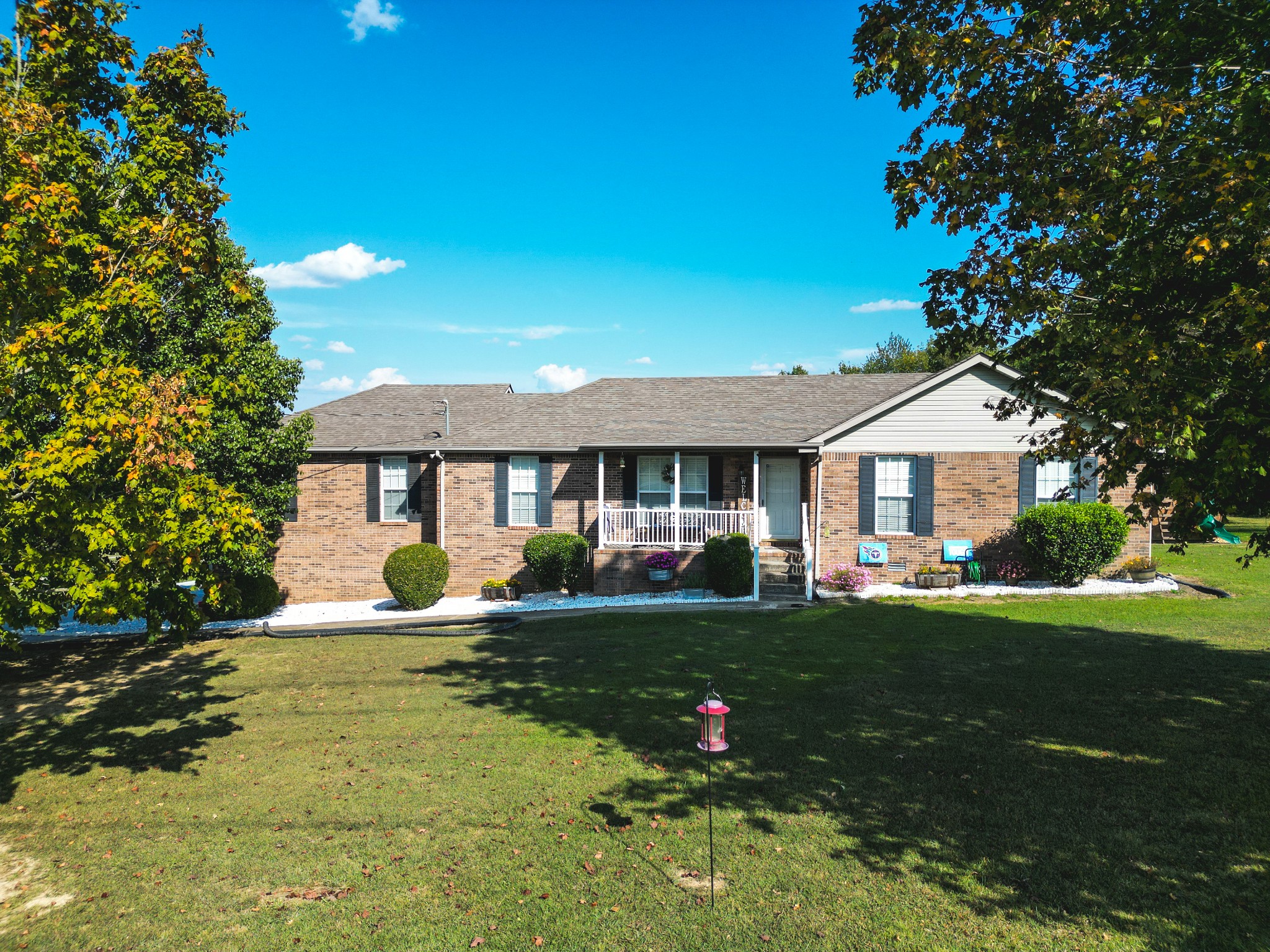 1179 Sugar Flat Road Lebanon, TN 37087 - Photo 1 of 42 a front view of a house with a yard