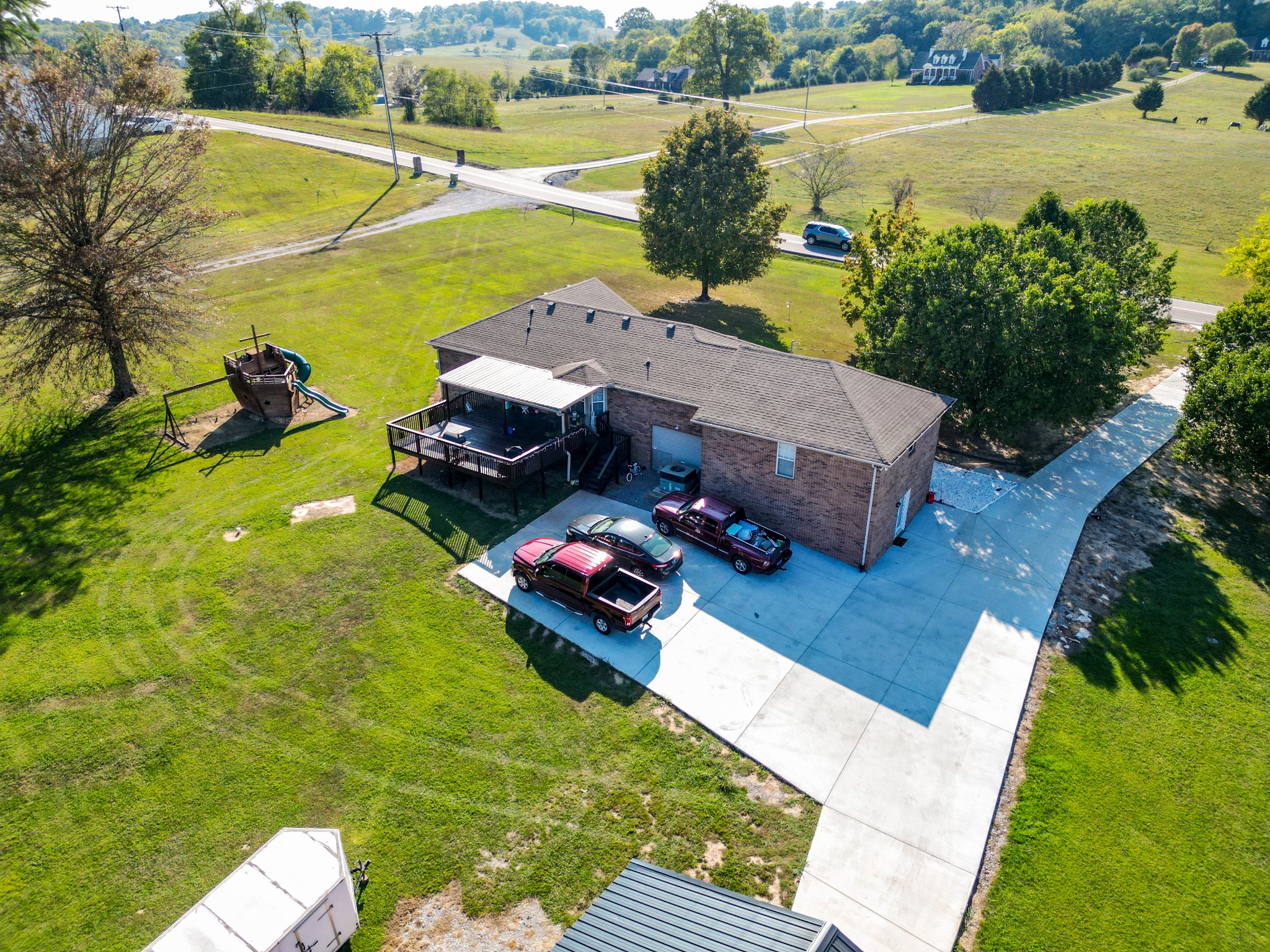 1179 Sugar Flat Road Lebanon, TN 37087 - Photo 4 of 42 a aerial view of a house with a garden