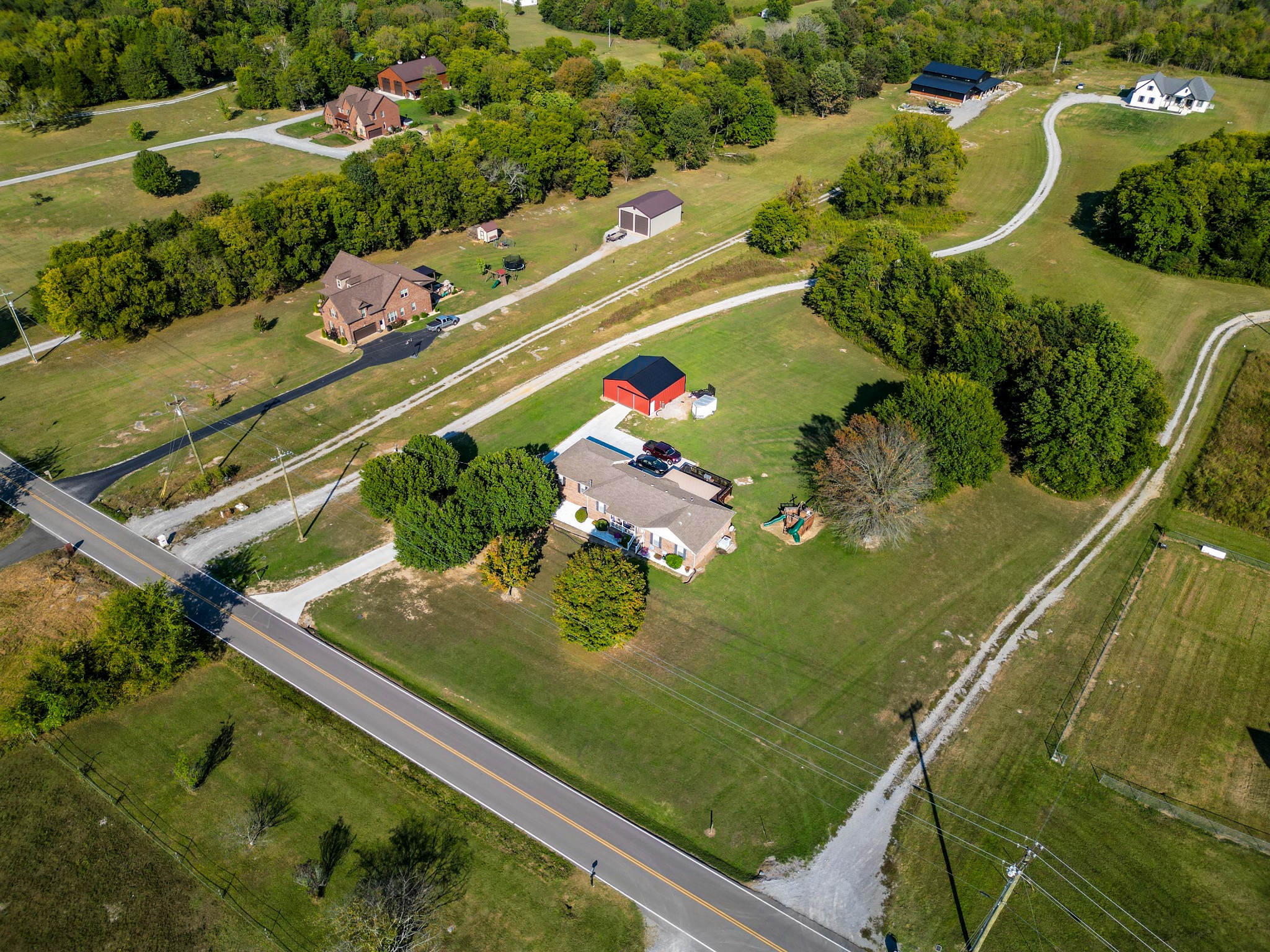 1179 Sugar Flat Road Lebanon, TN 37087 - Photo 6 of 42 an aerial view of a pool yard