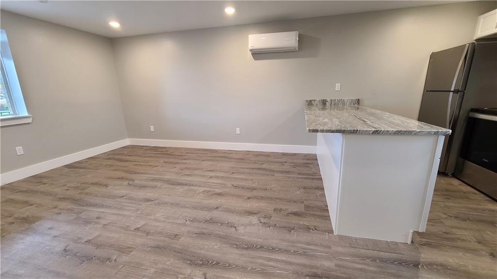 1331 Freeport Road Cheswick, PA 15024 - Photo 21 of 32 a view of kitchen with stainless steel appliances cabinets and wooden floor