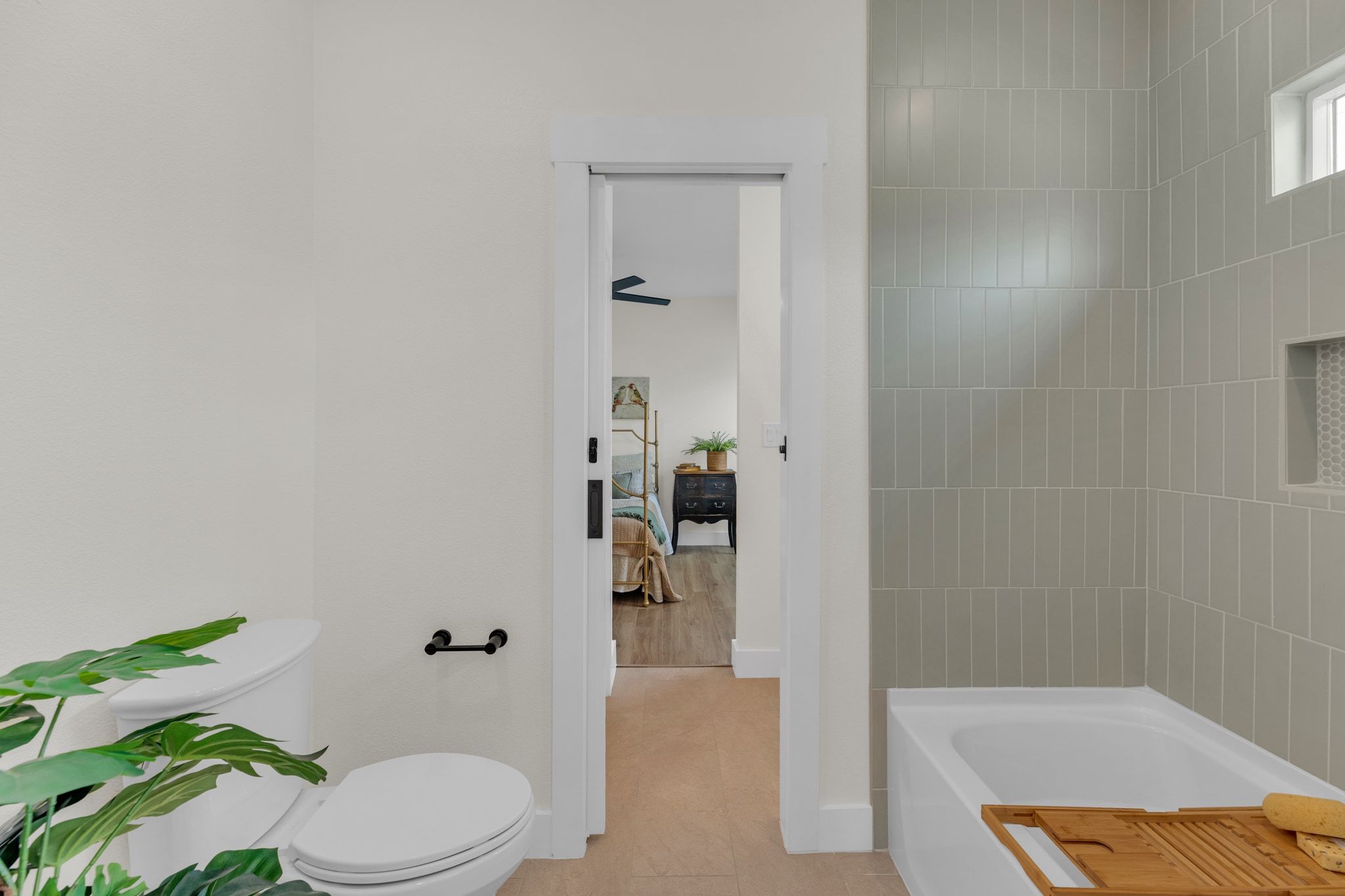 2102 South Church Street Georgetown, TX 78626 - Photo 21 of 40 Jack and Jill bathroom with tub view.