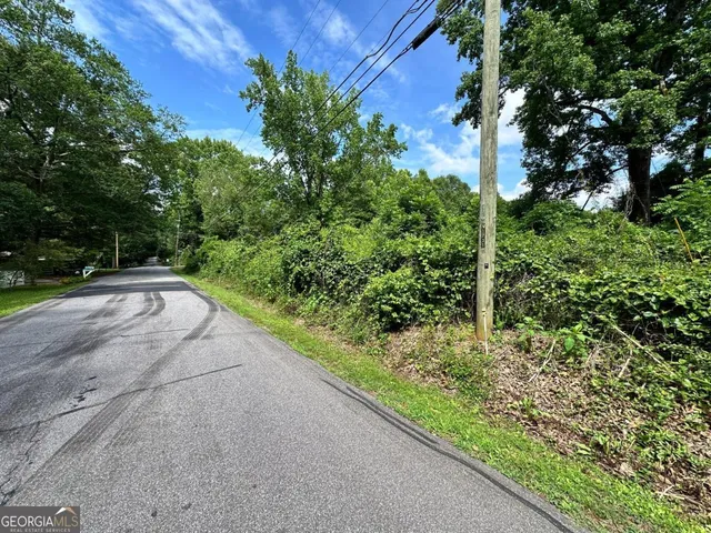 a view of street along with trees