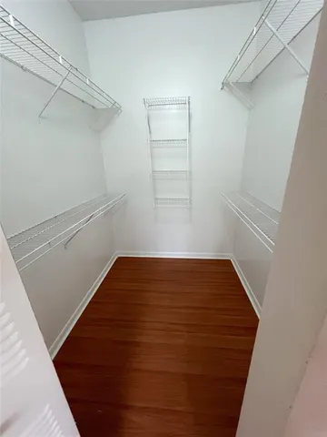 a bathroom with a glass door shower