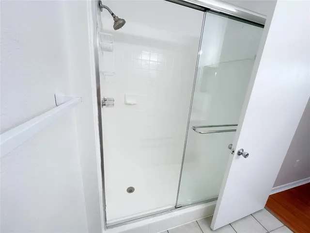 a bathroom with a sink toilet and mirror