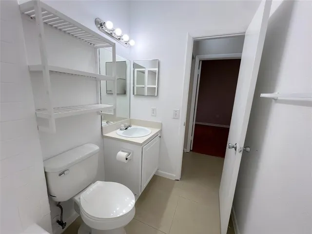 a view of balcony with furniture