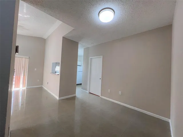 an empty room with an entryway