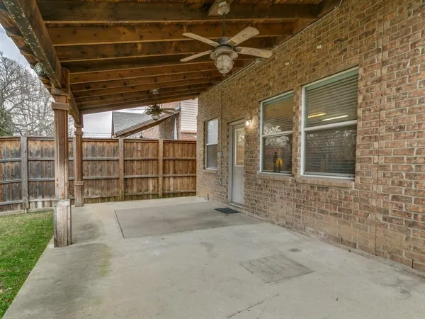 a view of an empty room with a iron stairs